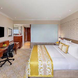 Deluxe Room King Bed Forest Pool View